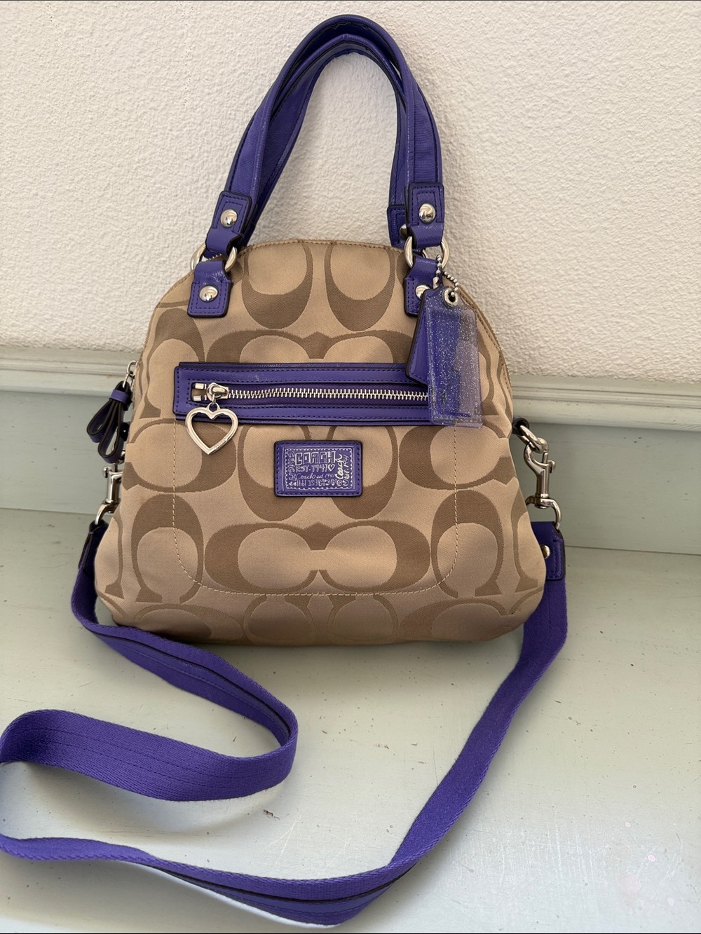 COACH POPPY DAISY
CROSSBODY~SATCHEL Signature Canvas Crossbody with Purple Trim
